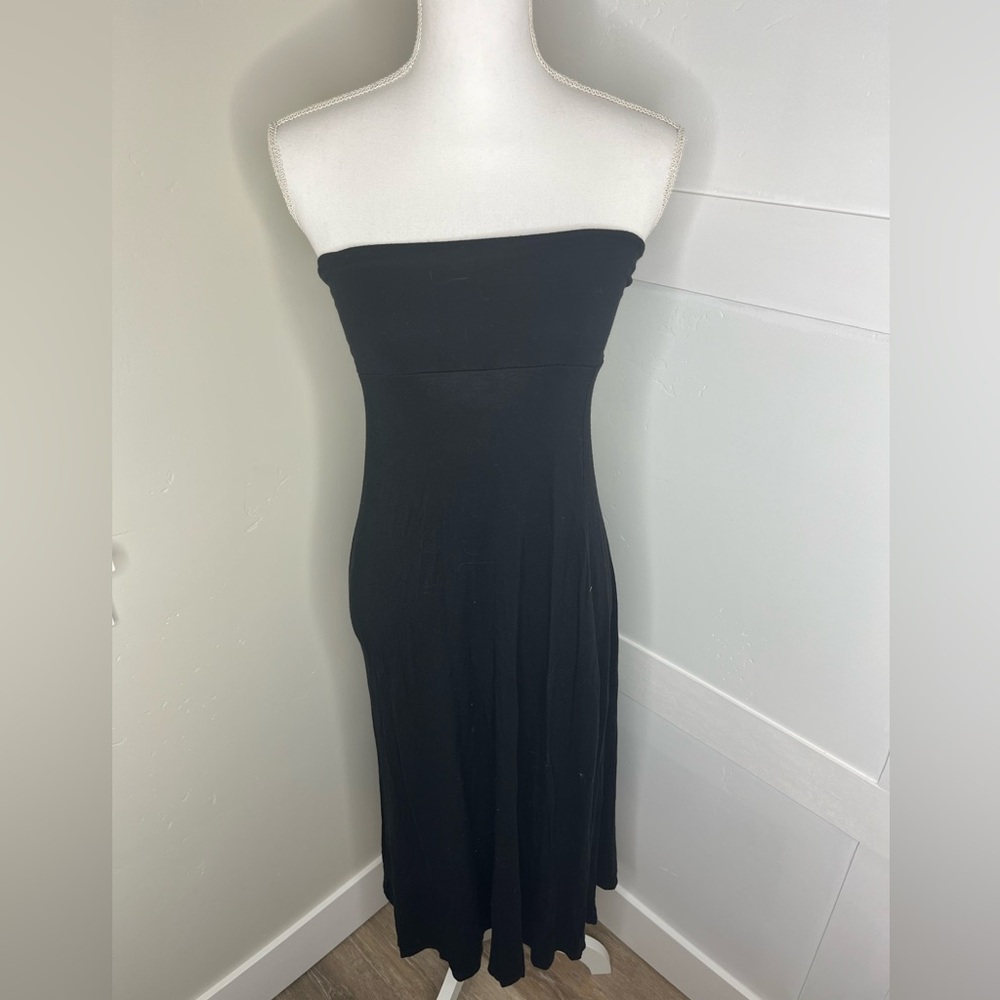 This is a maxi shoulderless black dress in the size medium